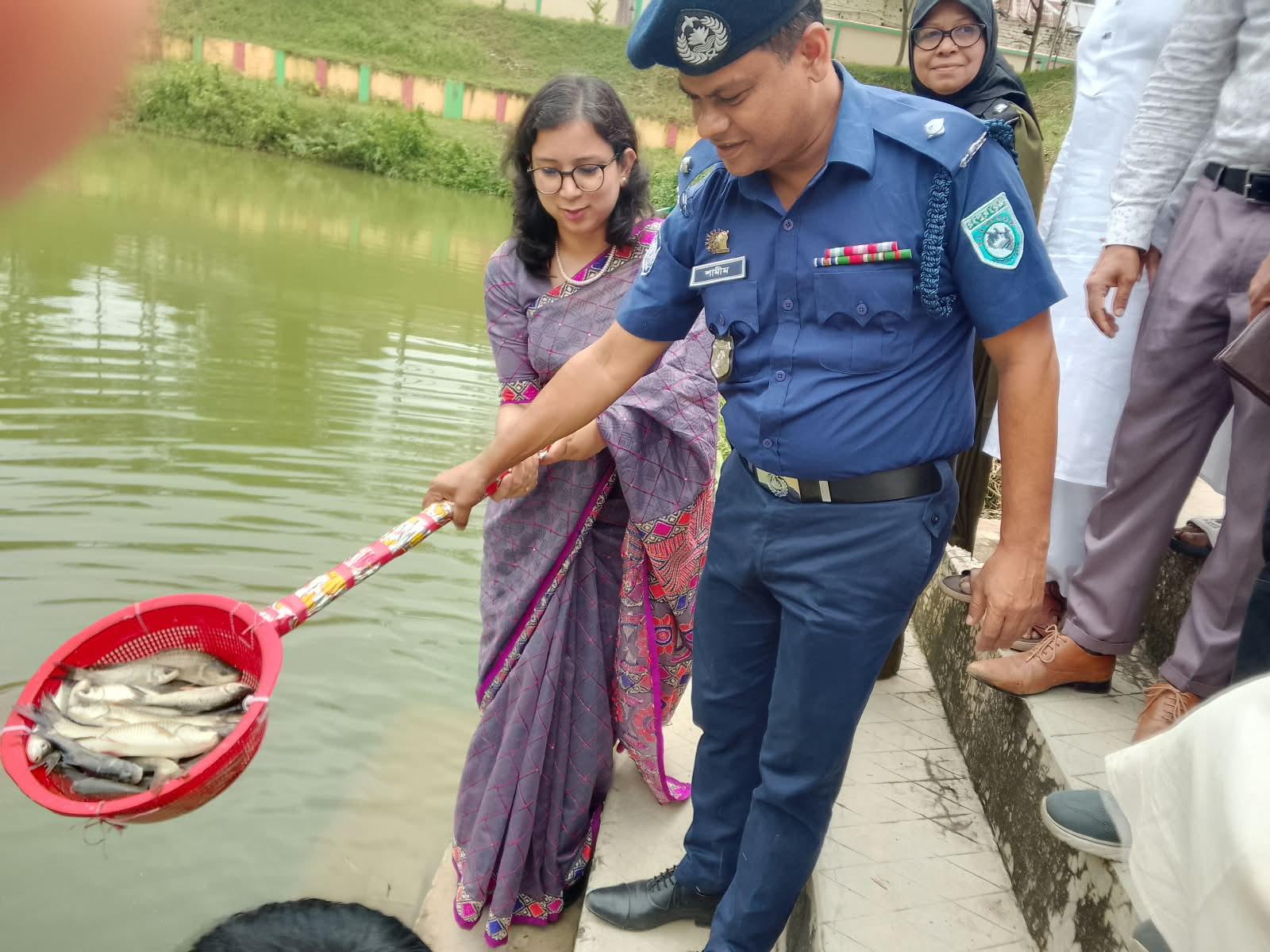 বিরামপুরে মাছের পোনা অবমুক্ত
